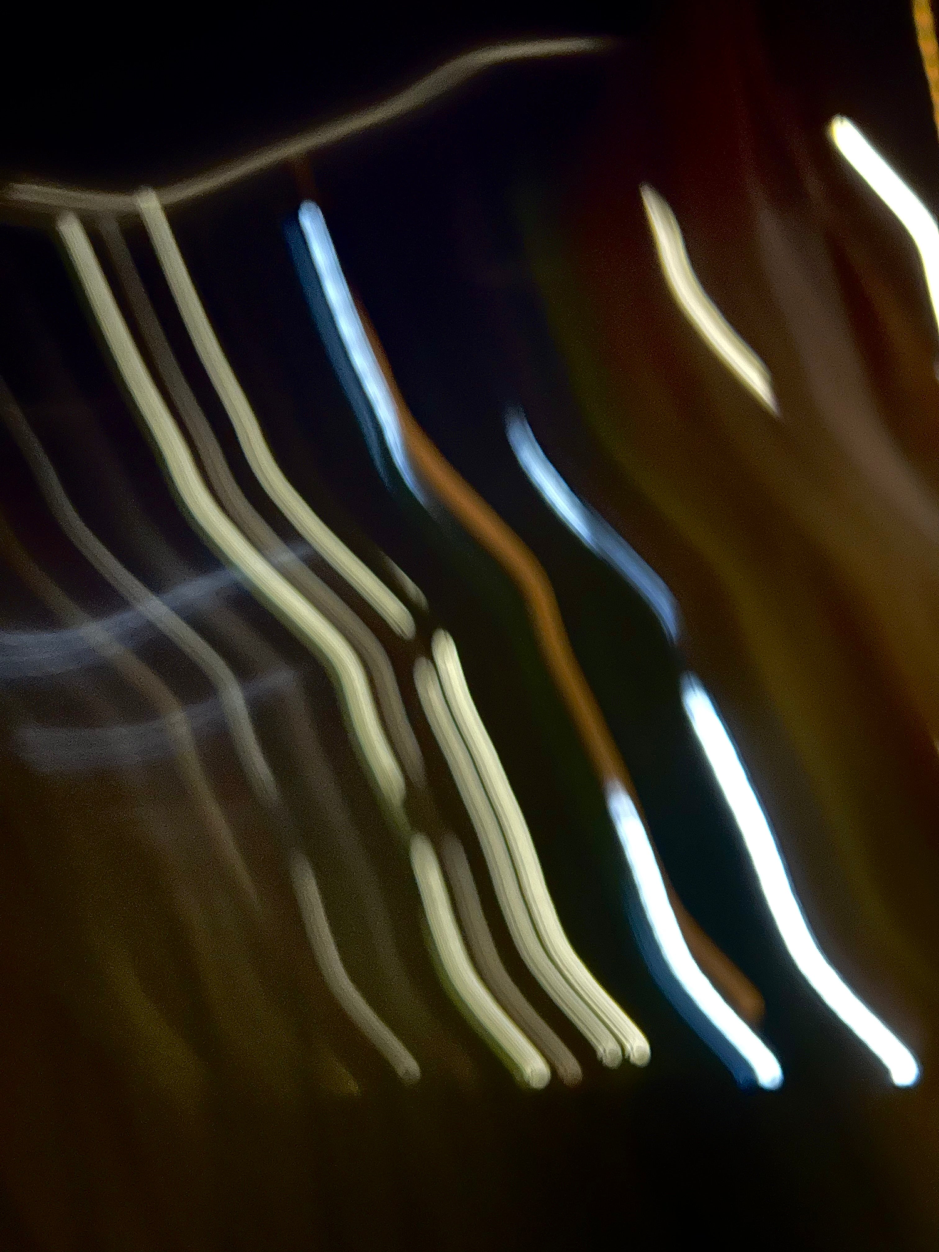 Blurred lights against black background