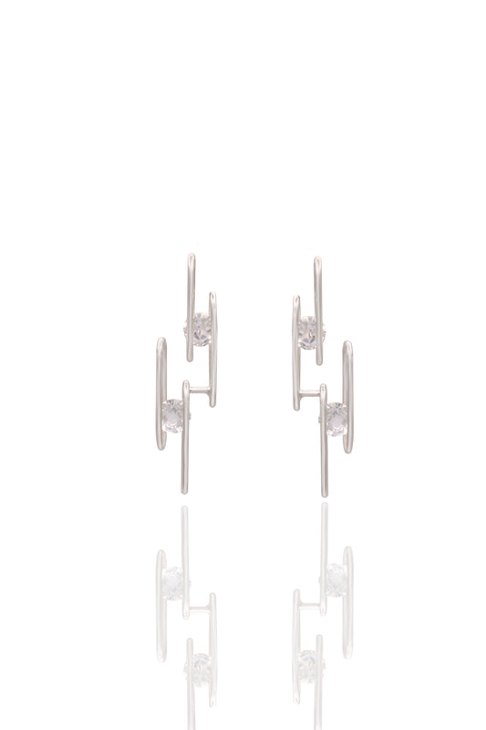Pair of silver earrings on a white background