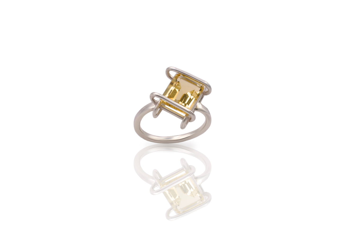 Gold and silver ring on a white background