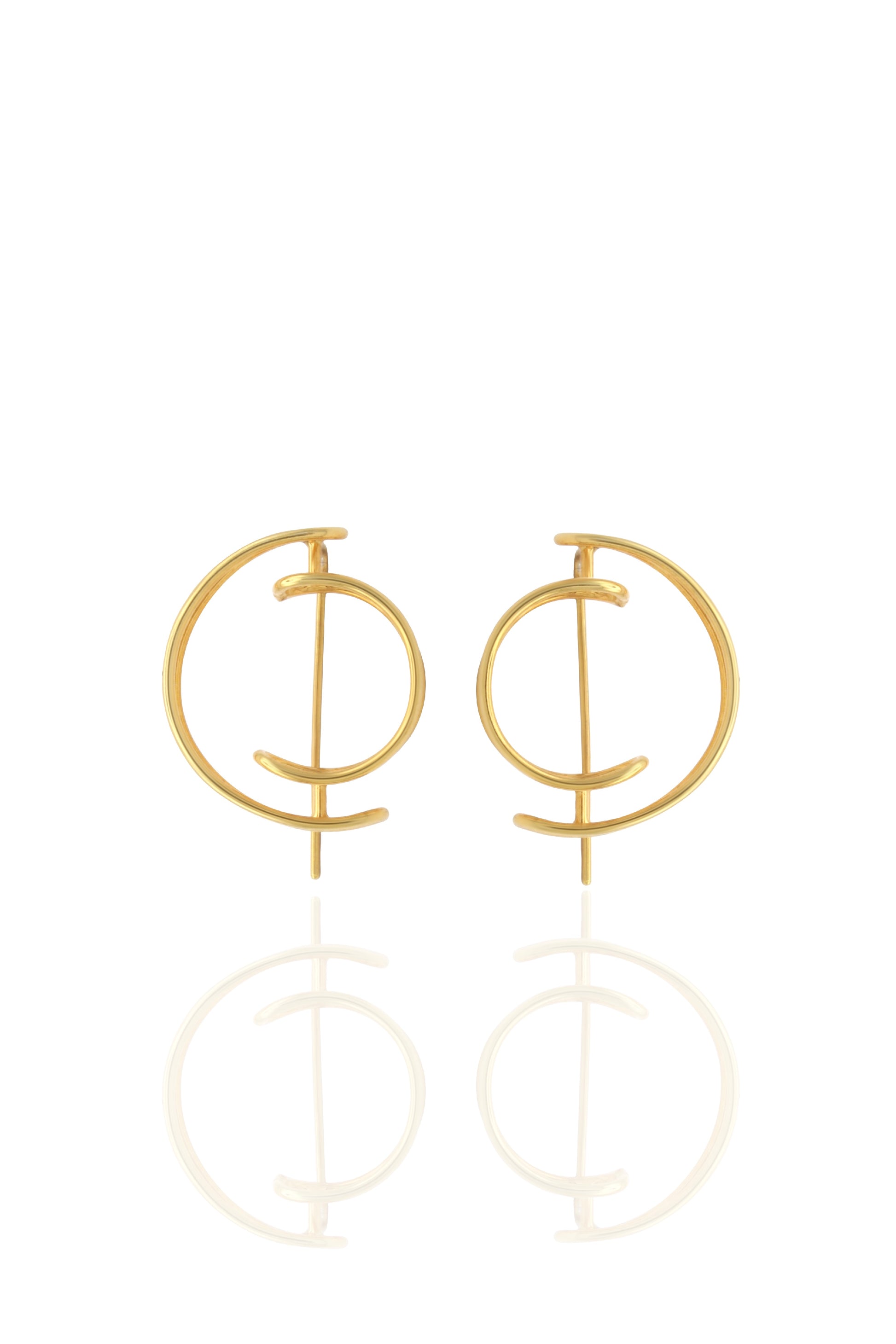 Gold hoop earrings on a white background