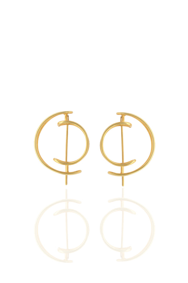 Gold hoop earrings on a white background