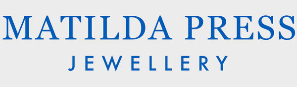 Matilda Press Jewellery logo with blue text on a white background