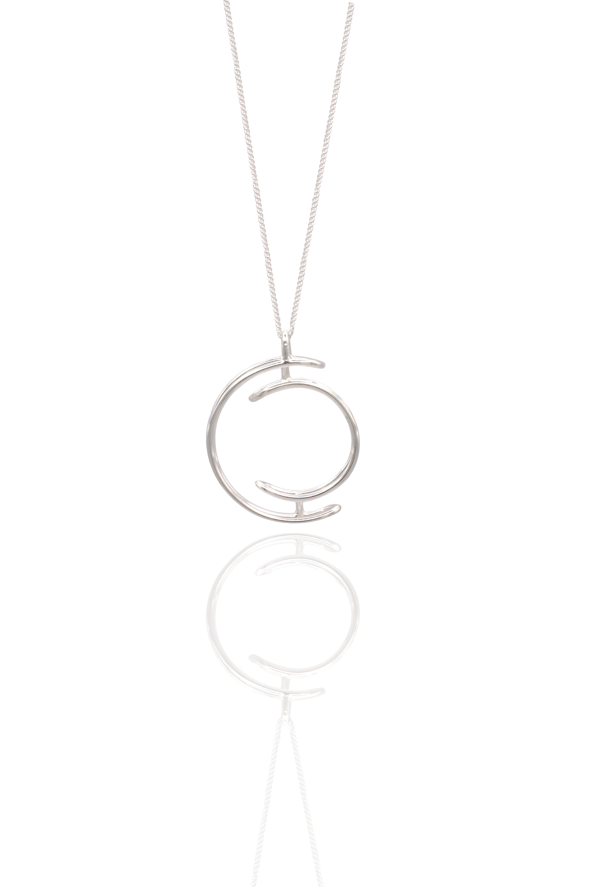 Silver necklace with a unique pendant on a white background